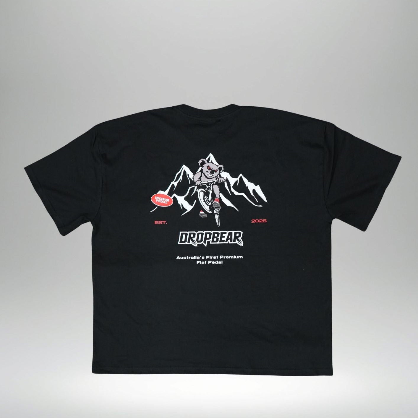 Black t-shirt with white graphic design on a gray background
